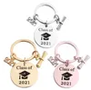 Party gåvor 2021 Rostfritt stål Keychain Pendant klass av examen säsong spänne plus scroll öppning ceremoni gåva nyckelring 30mm sn5376