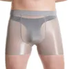 Underbyxor män oljiga boxare elastiska sömlösa underkläder mans simning trunkar trosor man u-convex pantie sexig transparent kort