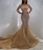 Sparkling Prom Dresses Champagne Sequins Crystal Long Sleeves Deep V Neck Sexy Sheer Beaded Mermaid Evening Dress Sweep Train Party Gowns