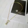 Collane con ciondolo Chiusura a levetta in oro Collana Boho Piccola perla d'acqua dolce genuina per le donne Gioielli unici