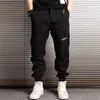 Mäns Jeans Streetwear Mode män Multi Fickor Designer Casual Cargo Pants Overaller Hip Hop Joggers Militär Camouflage Byxor