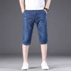 Letnie męskie szczupłe szorty Koreański styl Trendy Moda Klasyczne Stretch Luźne Dżinsy Męskie Business Casual Spodnie marki 210531