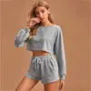 Casual Two Piece Set Pullover Colore solido Top corto e pantaloni corti allentati 2piece Set Donne Moda Sport Sexy Sport Tracksuiti femminili