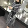 Kvinnors tröja kjol höst / vinter koreanska versionen av den smala passformen inre med rutig bottenskjorta stickad klänning 210520