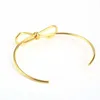 Rir de aço inoxidável ouro arco-nó pulseiras design exclusivo mulheres temperamento temperamento presente bracelete presente para ela q0719