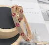 Donia 쥬얼리 럭셔리 팔찌 4 잎 꽃 과장된 티타늄 강철 마이크로 인 레이드 지르콘 유럽 및 미국 패션 디자이너 선물 상자