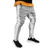 Män sida Stripe Fashion Pocket Byxor Casual Streetwear Jogger Pant Hip Hop Zipper Bottom Male Pencil Byxor Utomhus Sport Byxa 210714