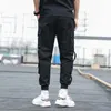 Tasche laterali da uomo Cargo Harem Pants Nastri Black Hip Hop Casual Pantaloni da jogging maschili Moda Streetwear 210715