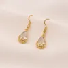 Boucles d'oreilles de pendentif en or fine 24K Bague Bague à chaîne tordu Drop blanc CZ Lucence Bijoux de mariée Ensembles de mariage