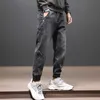 ファッションストリートウェアメンジーンズブラックグレー弾性ルーズフィットデニムハーレムパンツ韓国風ヒップホップワイドレッグスモールボトムズボン