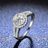 925 Sterling Silver Halo Diamond Kvinnor 1 CT 100% GRA Moissanite Engagement Ringar med Side Stone Bridal Band Fine Smycken