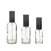 空の透明なガラス瓶の黒いスパイラートローションプレスポンプエッセンスエマルション化粧品包装香水詰め替え可能なバイアル5ml 10ml 15ml 20ml 30ml 50ml 100ml