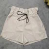 PU Läder Shorts Kvinnor Högt midja Tether Flower Bud Wide Leg Höst Vinter Koreansk Loose Street Womens 210615