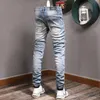 Calças jeans masculinas skinny fit com painel e elástico em azul 295C