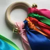 7 colores Rainbow Hand Kites Anillo de madera Cinta Streamer Runner Accesorios Juguetes Anillos de baile Cintas sensoriales Varita de viento para fiesta de cumpleaños Favores Regalo de Navidad