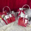 Geschenkpapier 2021 Kreative Kunststoff-PVC-Boxen mit Bändern Dekor Candy Box Handtaschen Weihnachtsverpackung Souvenir Containerkoffer