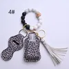 12 Colors Wooden Tassel Silicone Bead String Bracelet Keychain Bag Car key chain Wristband Hand Sanitizer Holder With Bottels For Woment Fashion Jewelry