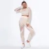 زي اليوغا 2pcs مجموعة سلسة مجموعة اللياقة البدنية المحصول العلوي جيم الملابس جاسلة طويلة الأكمام الجوارب عالية الخصر