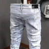 Erkek kot Amerikan sokak tarzı moda erkekler retro açık mavi ince fit yırtık boncuk yama tasarımcısı hip hop denim punk pantolon