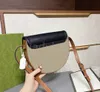 2021 Luxury Designers Lady Fashion Half Moon Bags Saddle Bag Letter Plain Canvas Cowhide Cover Lock Card Holders Coin Purses Wallet Handbags Interior Zipper Pocket