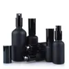 2021 Matt Black Glass Essential Oil Perfume Packing Flaskor med fin dimma Sprayer / Lotion Pump