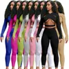 Femmes Tracksuits NightClub Couleur Sexy Cross Cut Sports Two Piece Costume Tenue de concepteur Vêtements 2021 Cardigan Pantalon à manches longues à manches longues Jogger Ensembles