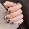 Falska naglar 24pcs / box Tryck på falsk nagelkonst Kort sött svart leopardtryck med artificiella mönster Full omslagstips