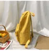 Backpack 2021 de alta qualidade tela impressa S Amarelo Estilo coreano Viagem Estudantes Saco Girls School nylon impermeável