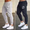 2021 رجل ركض الصيف Sweatpants صالات رياضية بانت اللياقة البدنية العلامة التجارية بنطلون كرة السلة الجري رياضية عالية الجودة الملابس الرجال عادية مصمم السراويل المسار