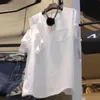 春の夏のフリルパッチワークオフショルダーの中空下半袖ソリッドホワイトTシャツ女性のトップ210615