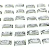 Entier 100pcs Lot Mode En Acier Inoxydable Spin Band Anneaux Noir Gravé Motifs Mixtes Bijoux Hommes Femmes Rotatif Bague De Fête 237r