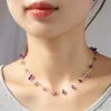 collier tour de cou violet