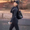 CNYISHE FASHION SOLID SVART SPORTY TRACKSUIT KVINNA KOMMATTERA SETER Långärmad träningspärrtopp och leggings Tvådelade kläder 210419