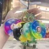 Portachiavi del fumetto Pop It Fidget Toy Portachiavi Anello Design anime Giocattoli di decompressione sensoriale Arcobaleno Push Bubble Poppers Puzzle da tavolo Gioco per dita per bambini per adulti Regali di Natale