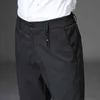 Pantaloni da uomo di moda di alta qualità di marca Pantaloni lunghi dritti classici da lavoro estivi sottili Inghilterra a righe scozzesi pantaloni casual da uomo 211119