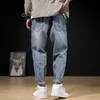 Projektant mody Mężczyźni Jeans Japoński Vintage Luźne Dżnkie Dżnuse Spodnie Retro Light Blue Streetwear Szerokie nogi Baggy Spodnie