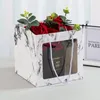 Créatif fenêtre Portable cadeau sac blanc Borwn marbrure papier sac vêtements général fleur cadeau sac à main en gros