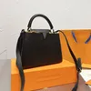 Borsa da donna classica Capucines Borsa tote Borsa a tracolla a tracolla in pelle bovina Tinta unita Borsa a mano in metallo Mark L di alta qualità