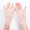 Femmes printemps été Protection solaire mitaines gants conduite en plein air mince UV-preuve solaire dame Sexy maille Floral dentelle gants Y0827