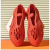 NXY 샌들 플러스 사이즈 45 새로운 여름 플랫폼 신발 해변 외부 고무 플라스틱 디자인 애호가 캐주얼 남성 여성 0210