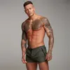 Moda Sexy Man Siłownia Swimwear Szorty Męskie Stroje kąpielowe Kwiaty Sunga Chłopcy Pływanie Plaże Plażowe Spodnie Mayo Casual Garnitury Pokrowiec wesoły