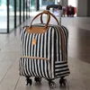 Sac de voyage imperméable à haute opacité Style épais valise à roulettes chariot bagages dame hommes sacs de voyage avec roues fournitures valises2693