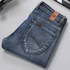 Vår och höst plus storlek jeans tunna slanka rakt bensträcka affärer casual långa byxor medelålders mäns märkesbyxor 210531