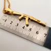 18k Gold Plated Machine Gun Pendant Army Charm Bullet Halsband Rostfritt stål 27 tum70 cm lång låda kedja halsband men039s c9179078