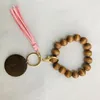 Hårsmycken 6 stilar Träarmband Keychain med tofsar Key DIY Wood Fiber Pandent Wood Bead Bangle Key dekorera mode