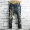 Jeans da uomo blu retrò primavera punk ricamo pantaloni denim tigre Pantalones Para Hombre Vaqueros