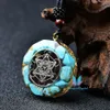 Collar con colgante de orgonita de howlita azul, cristal curativo redondo, símbolo de 7 chakras