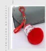 12 Styles festifs grand rouge père noël moelleux porte-clés fausse fourrure de lapin boule Pom pon porte-clés femmes sac porte-clés EEC2927