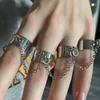 anillos de cuatro dedos