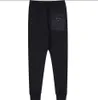 Modne markowe spodnie sportowe męskie patyki dresowe joggery z odznaką Wysokiej jakości mężczyźni śledzą spodni spodni długie spodnie 289V